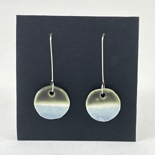 Pair of circular porcelain earrings with  bands of colour: dark green, white and pale blue. On long sterling silver earring hooks.
