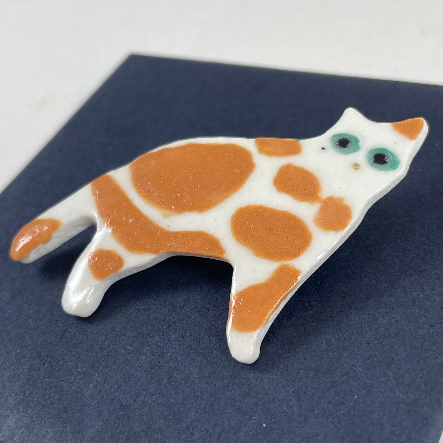 Porcelain brooch 005 - orange cat